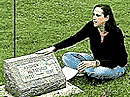 Kuypers reading Andrew Hettinger at St. Mary’s Cemetery in Champaign